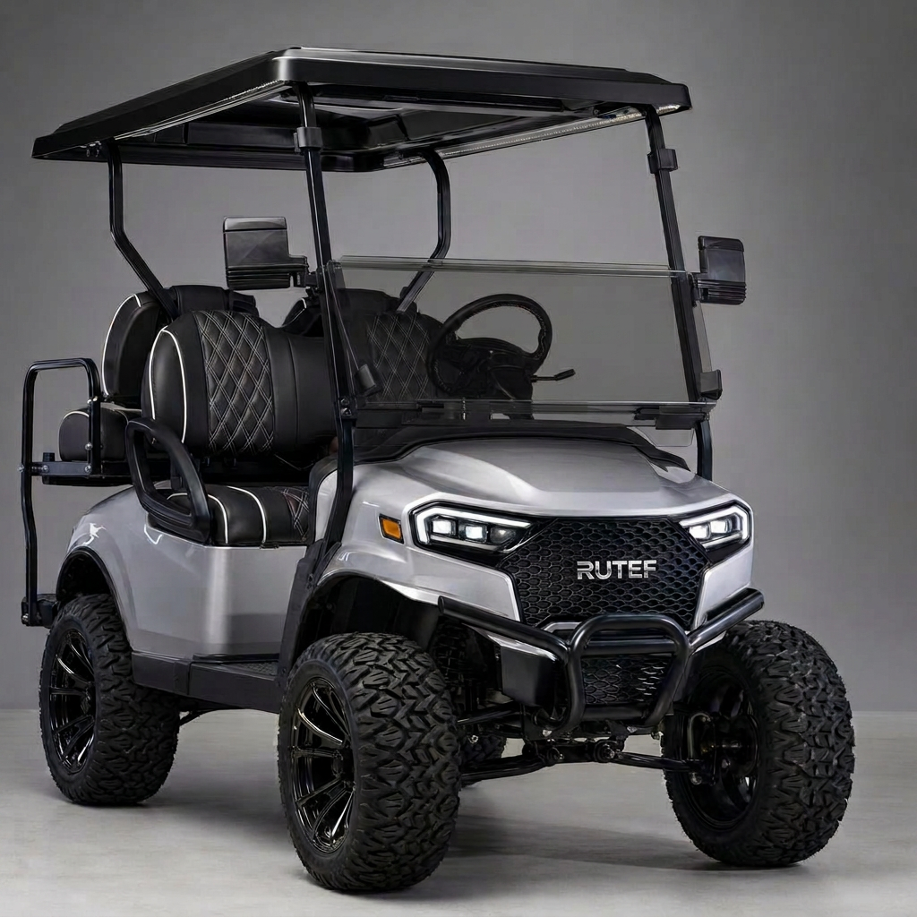 Silver metallic lifted four-seater golf cart with black roof, diamond-stitched black leather seats with white piping, and all-terrain tires in a studio setting
